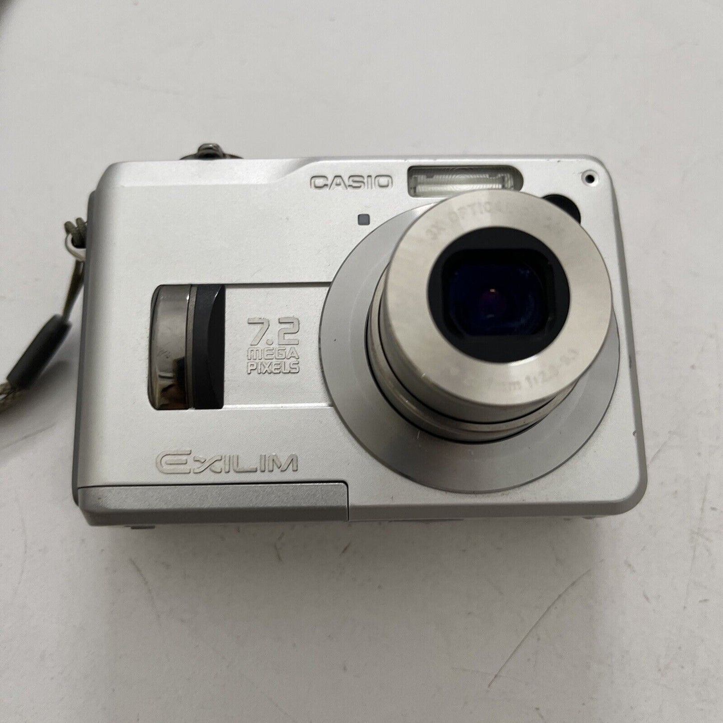 Casio EXILIM EX-Z120 Digital Camera 7.2 MP and 2 GB SD Card