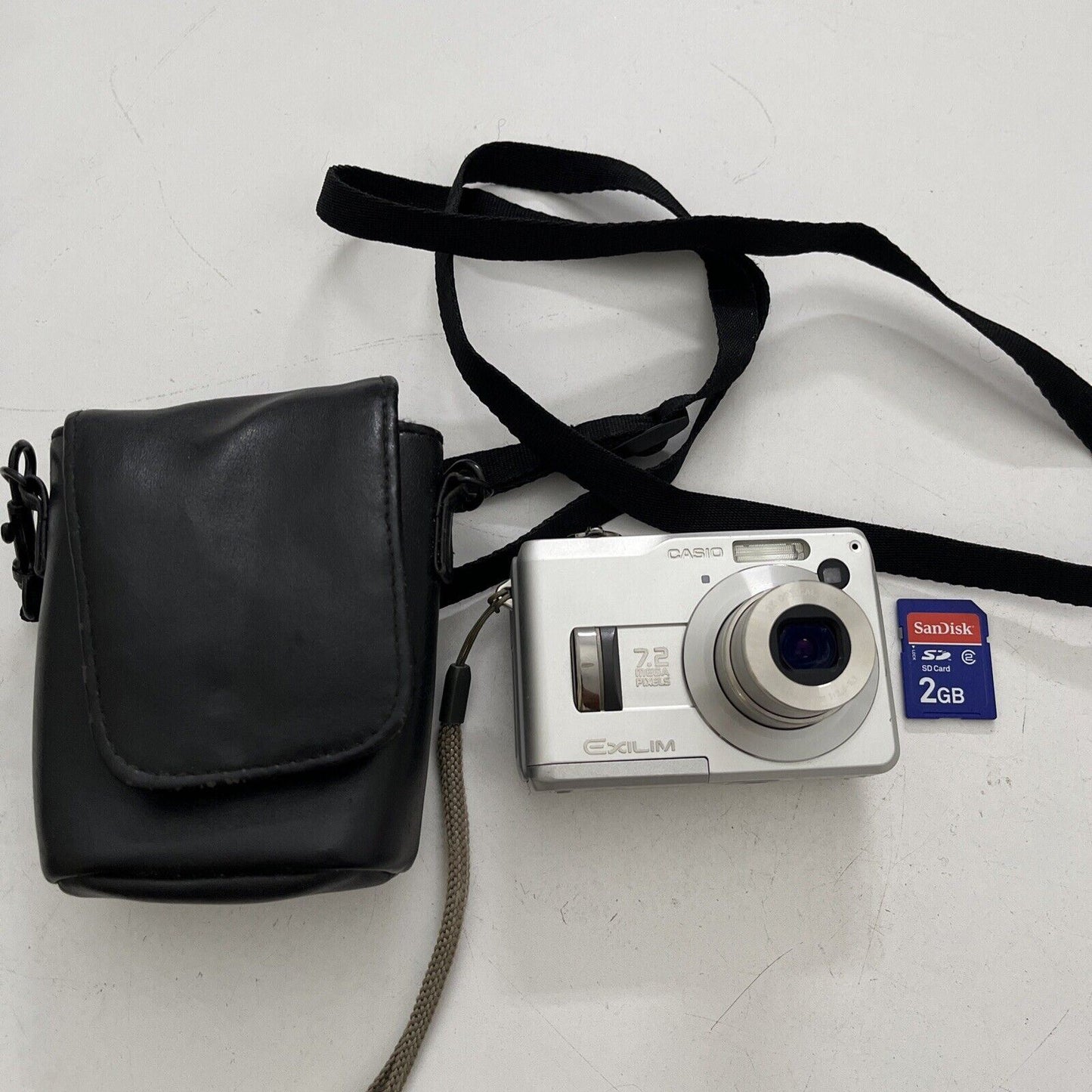 Casio EXILIM EX-Z120 Digital Camera 7.2 MP and 2 GB SD Card