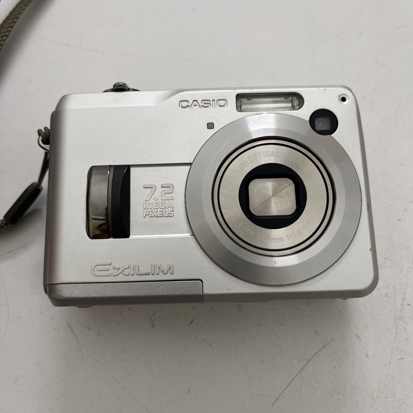 Casio EXILIM EX-Z120 Digital Camera 7.2 MP and 2 GB SD Card