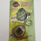 Jurassic Park The Lost World Tamagotchi Gold Portable Electronic Pet 1997 NEW