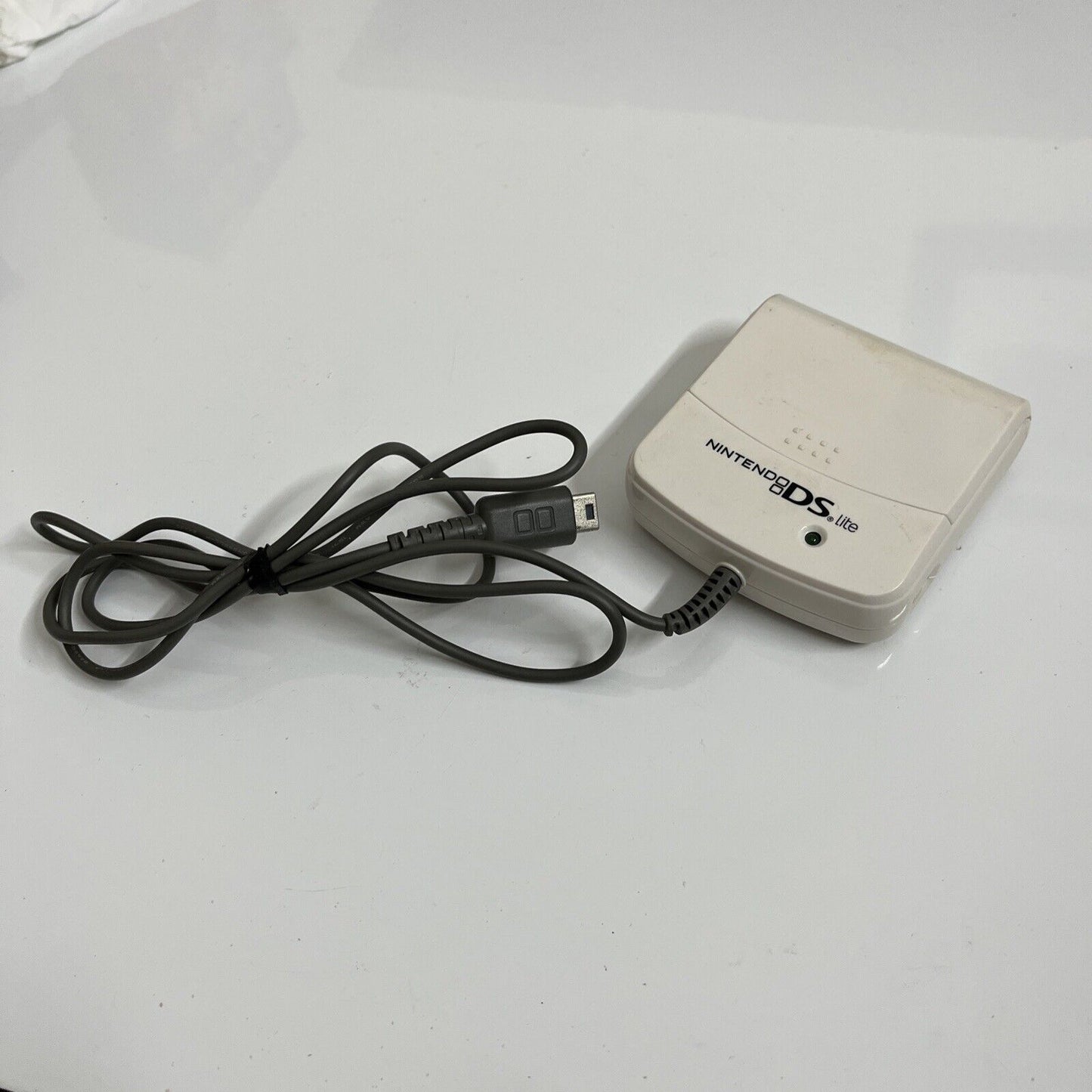 Nintendo DS Lite AA Battery Charger - Charges your DSLite with AA batteries