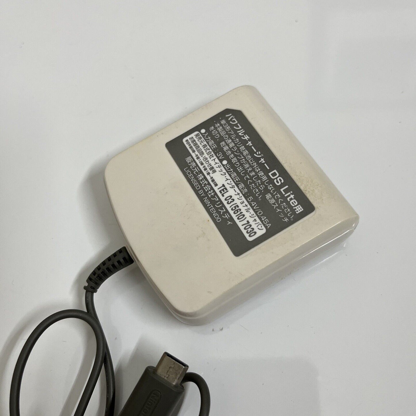 Nintendo DS Lite AA Battery Charger - Charges your DSLite with AA batteries