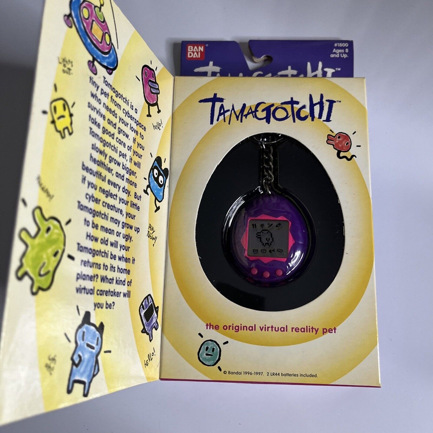 Original 1997 Tamagotchi Sealed in Box Purple  NEW