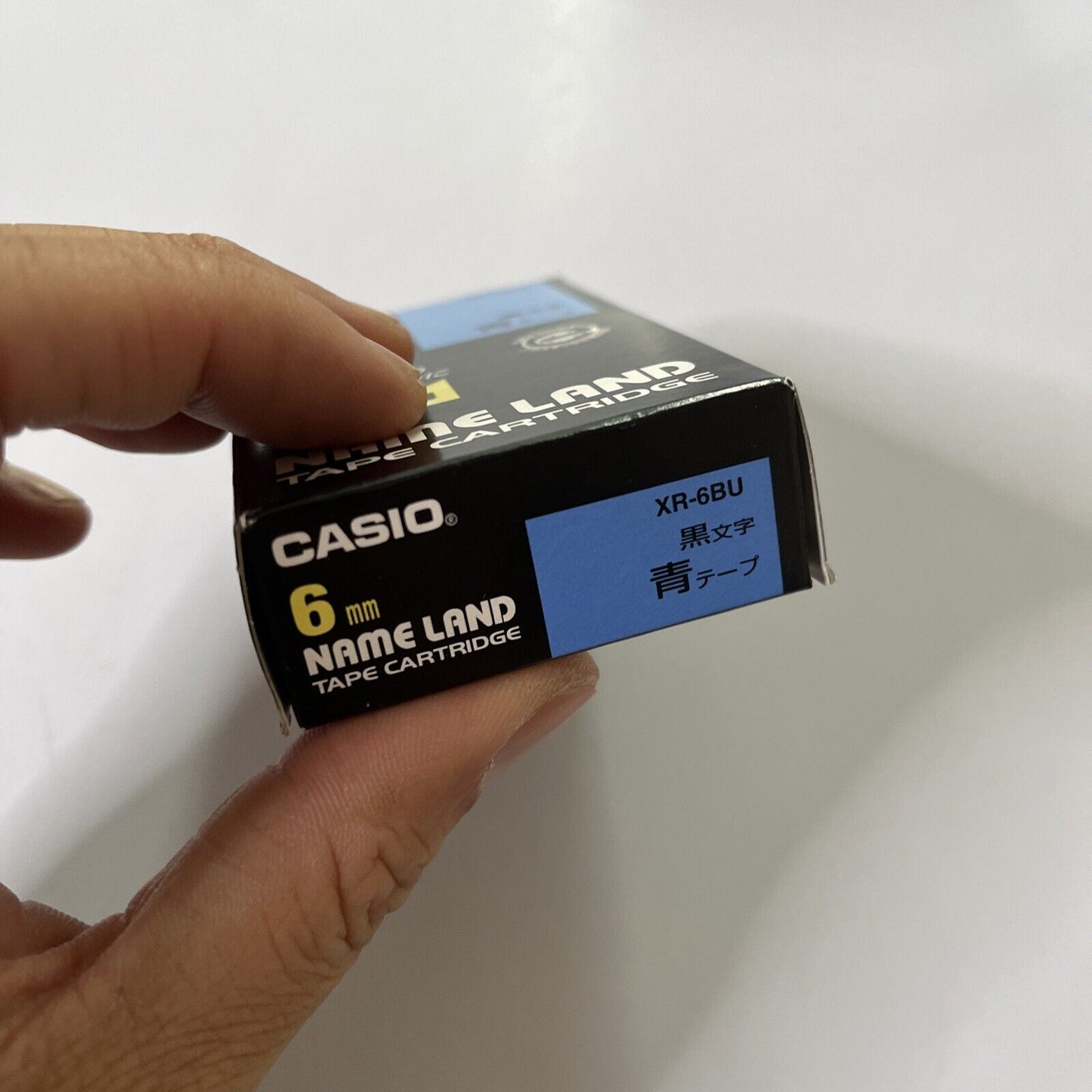 Casio Name Land Tape Cartridge 6mm Blue Background Black Text XR-6BU NEW