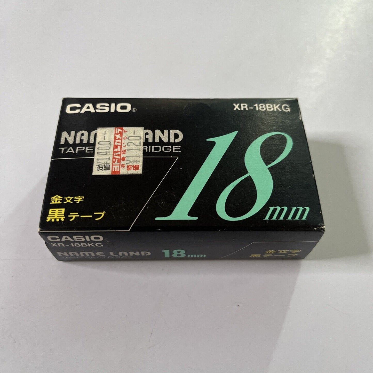 Casio Name Land Tape Cartridge 18mm Black Background Gold Text XR-18BKG  NEW