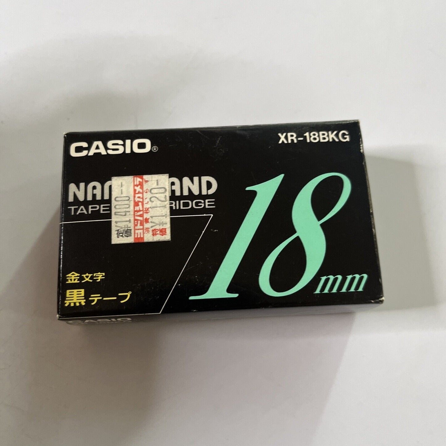 Casio Name Land Tape Cartridge 18mm Black Background Gold Text XR-18BKG  NEW