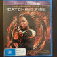 The Hunger Games - Catching Fire Blu-ray + Hungry Games Book by Suzanne Collins
