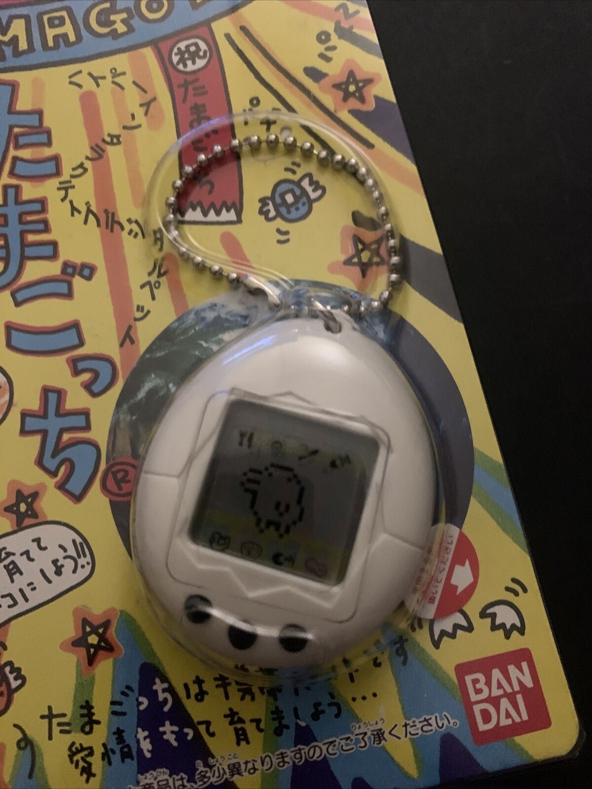 Original TAMAGOTCHI First Decade 1996 (White with Black Button) BANDAI