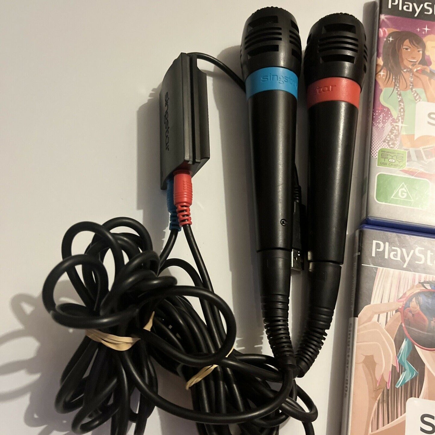 2x SingStar Microphones + 4 SingStar PS2 Games PAL: Anthems, ABBA, Pop, 80's