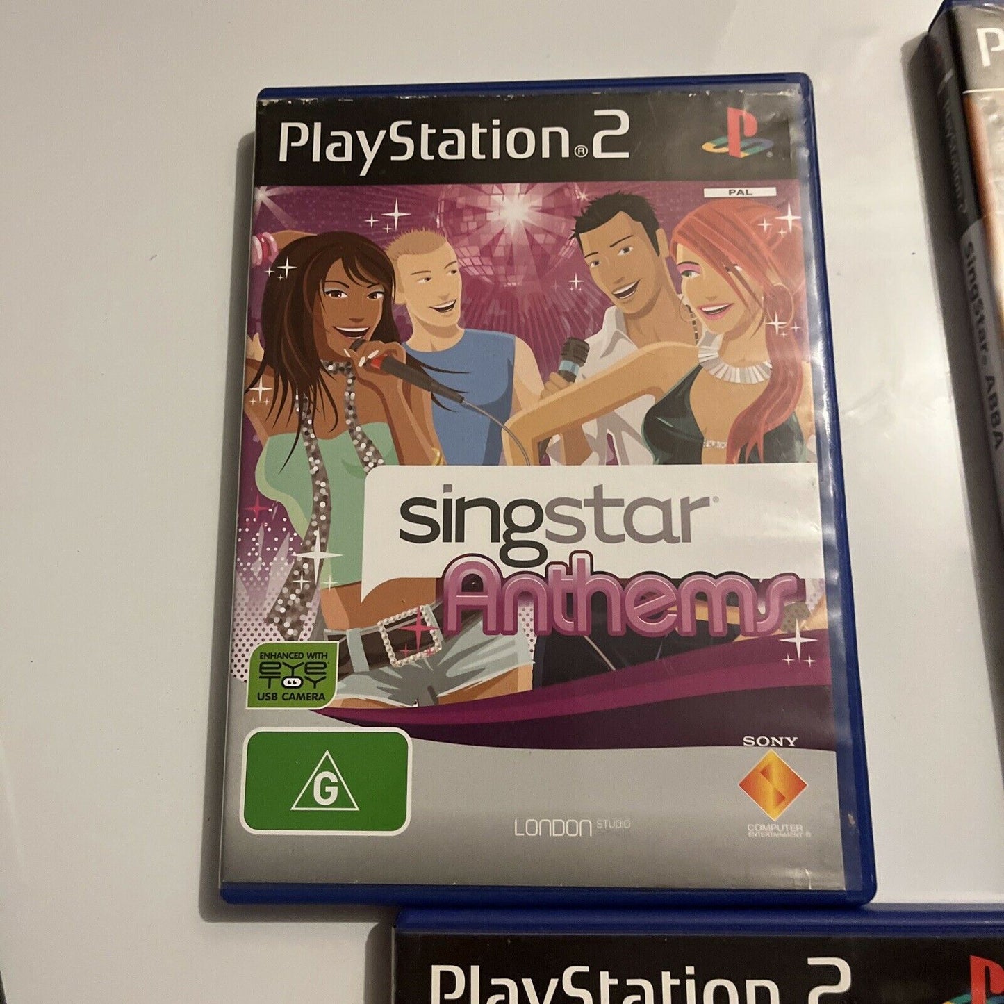 2x SingStar Microphones + 4 SingStar PS2 Games PAL: Anthems, ABBA, Pop, 80's