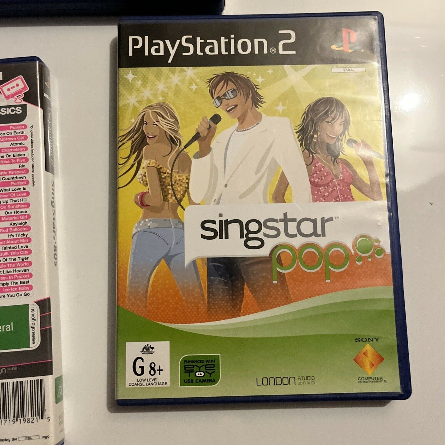 2x SingStar Microphones + 4 SingStar PS2 Games PAL: Anthems, ABBA, Pop, 80's