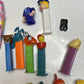 11x Pez Dispensers: Garfield, Batman, Barney, Pebbles, Tyke, The Ant & Aardvark