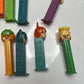 11x Pez Dispensers: Garfield, Batman, Barney, Pebbles, Tyke, The Ant & Aardvark