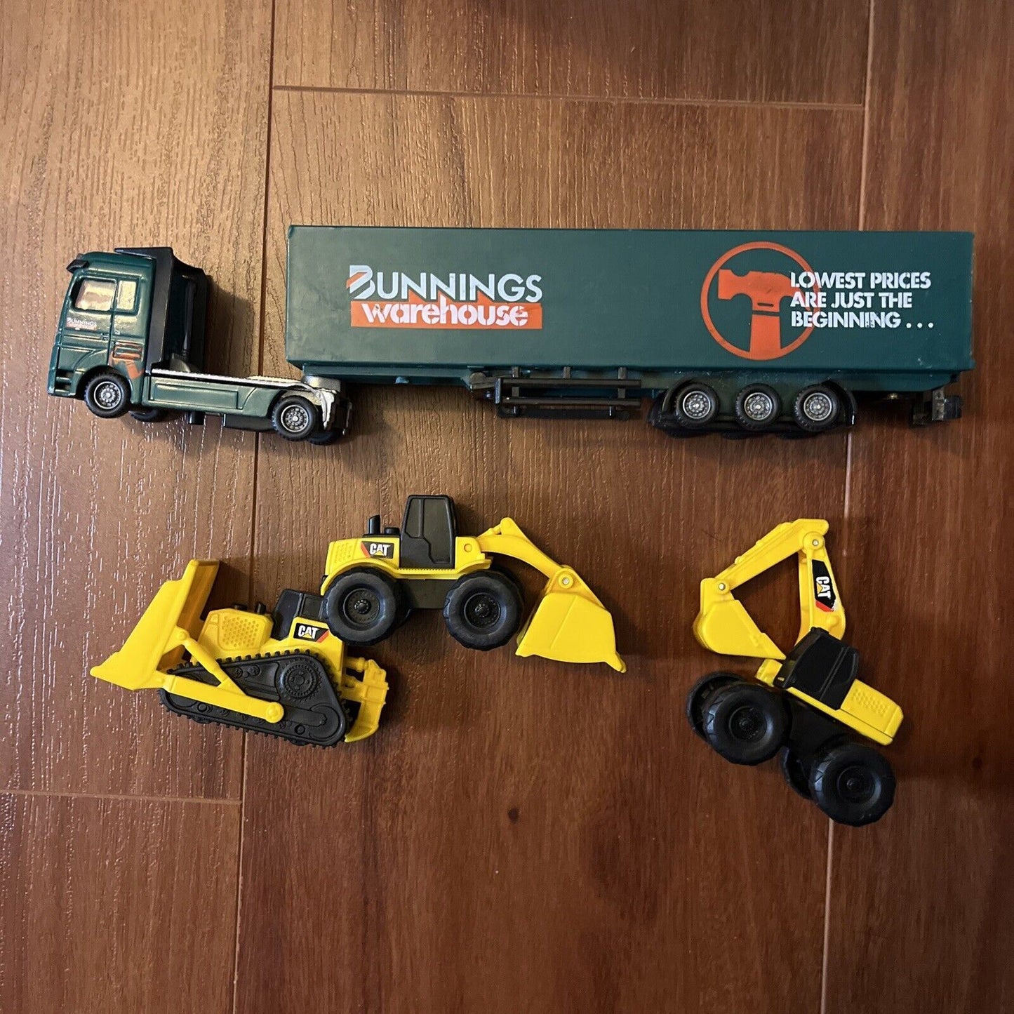 Bunnings Trailer Truck Die Cast and 3x Cat Contruction Vehicles