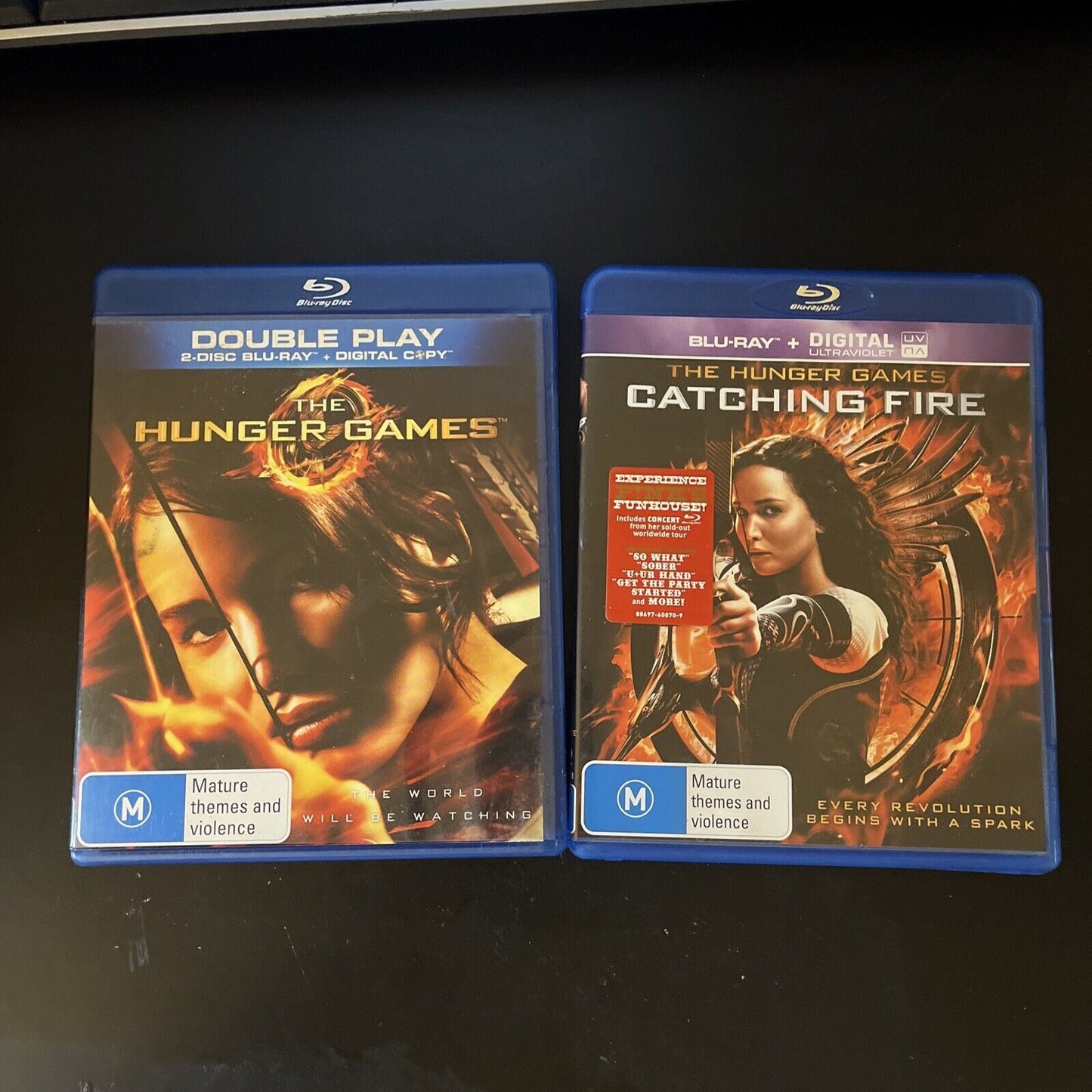 The Hunger Games / The Hunger Games Catching Fire (Blu-ray, 4-Disc) Region B