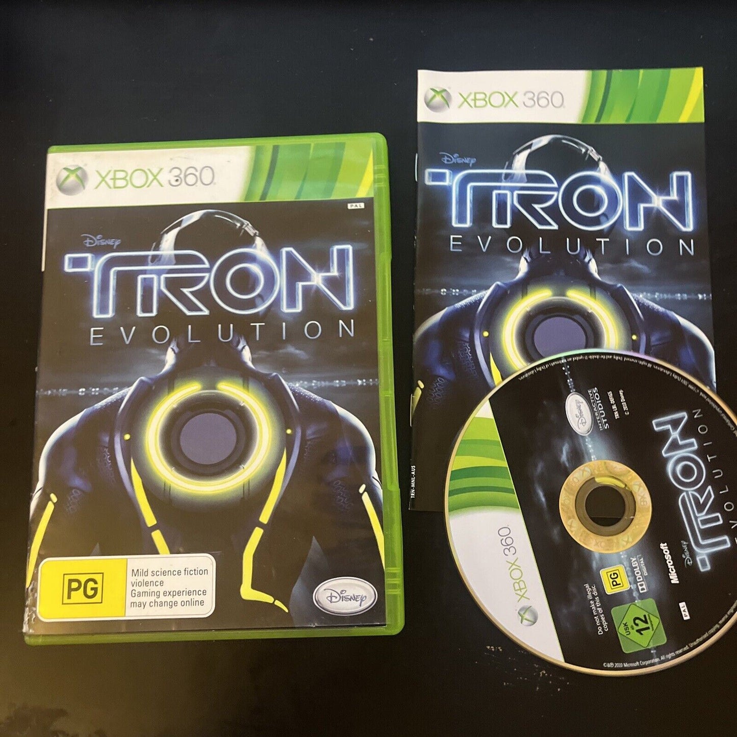 Tron Evolution (Microsoft Xbox 360, 2010) with Manual PAL