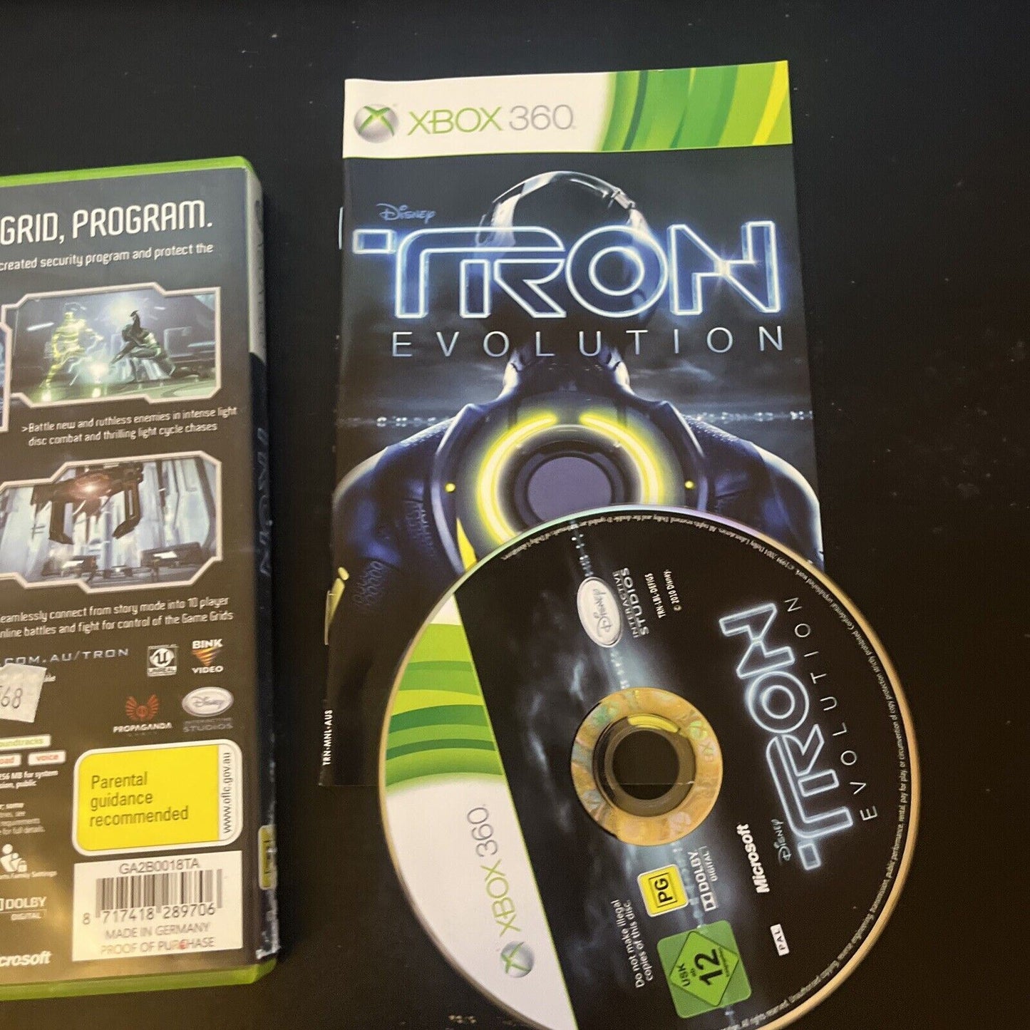 Tron Evolution (Microsoft Xbox 360, 2010) with Manual PAL