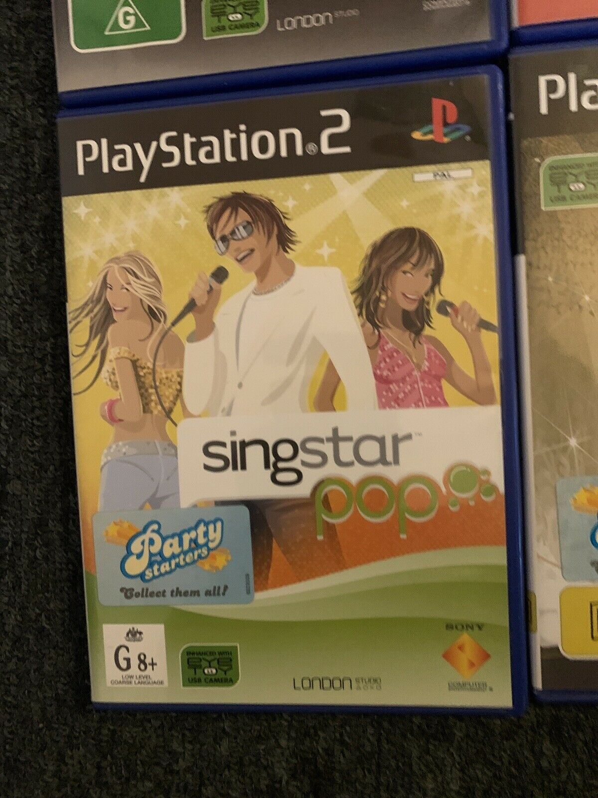 8x SingStar PS2 PAL Games Bundle + 2x SingStar PS2 Microphones - Tested and work