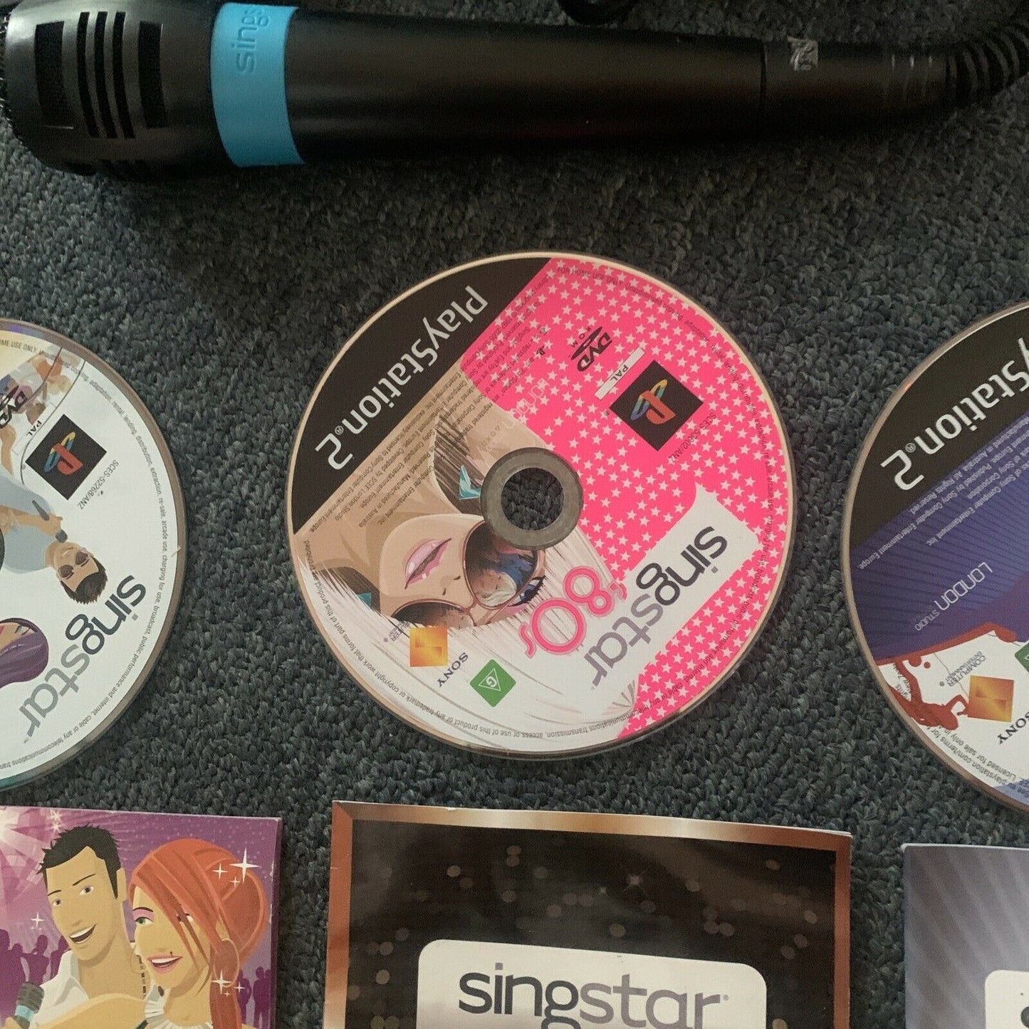 9x Singstar PS2 Games & 2x Singstar Microphones USB