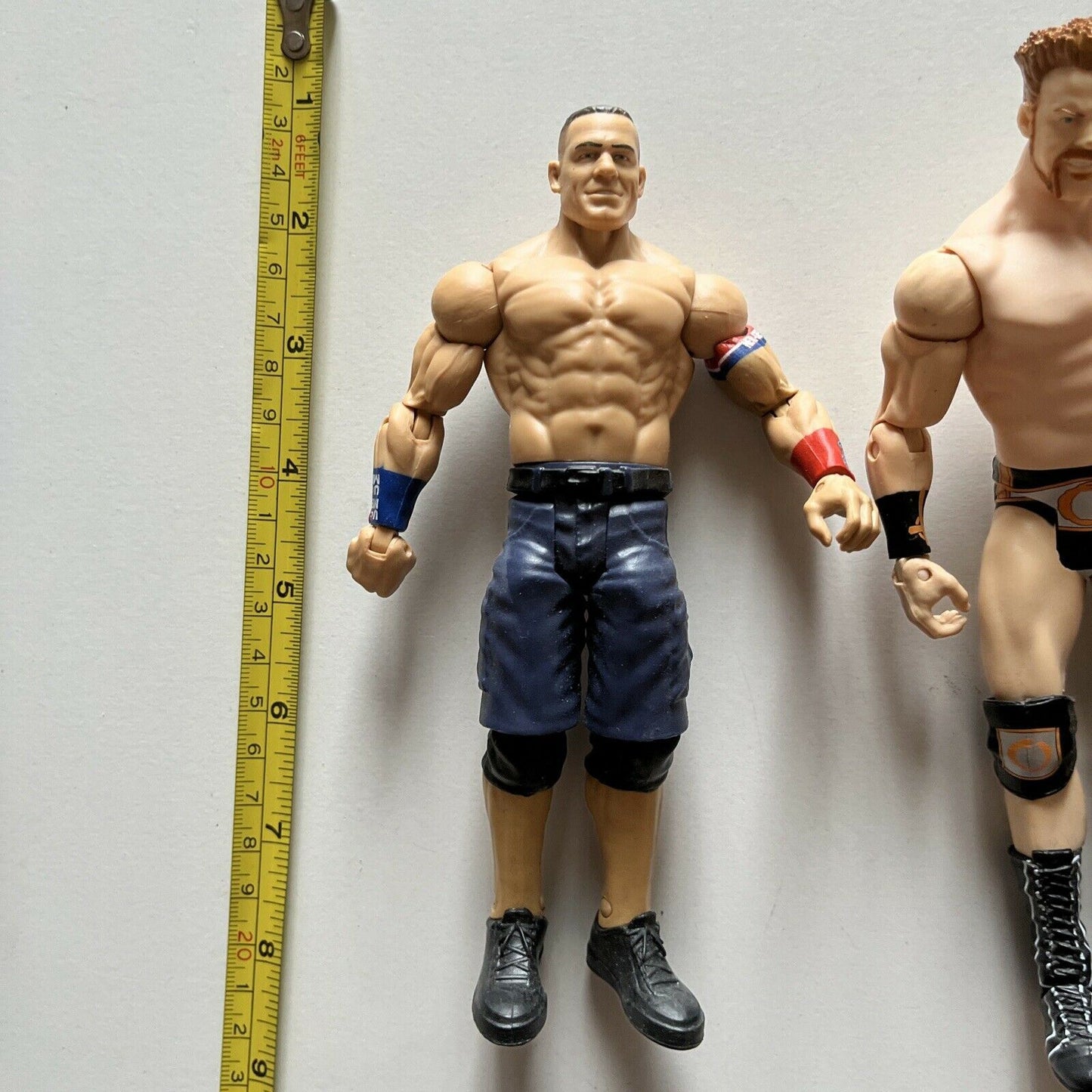 5 WWE Action Figures: The Rock, Sheamus, Roman Reigns, Triple H, John Cena