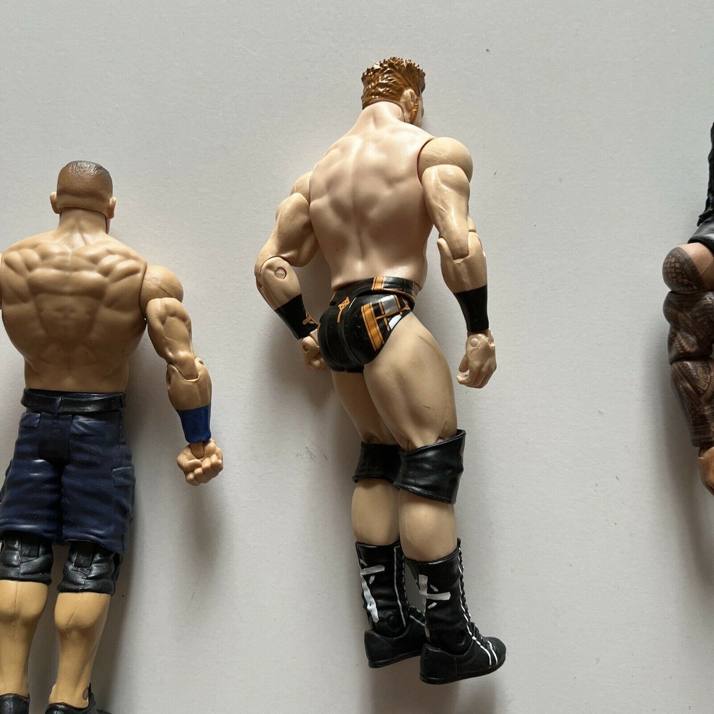 5 WWE Action Figures: The Rock, Sheamus, Roman Reigns, Triple H, John Cena