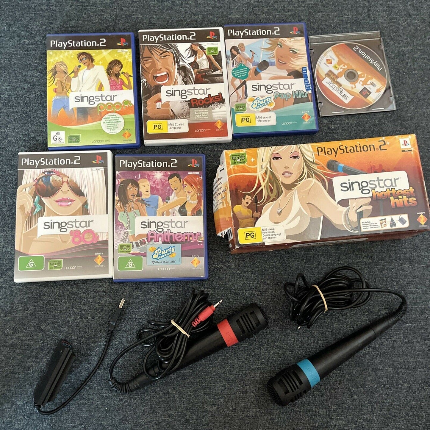 2x SingStar Microphones USB + 6x SingStar PlayStation 2 PS2 Games PAL