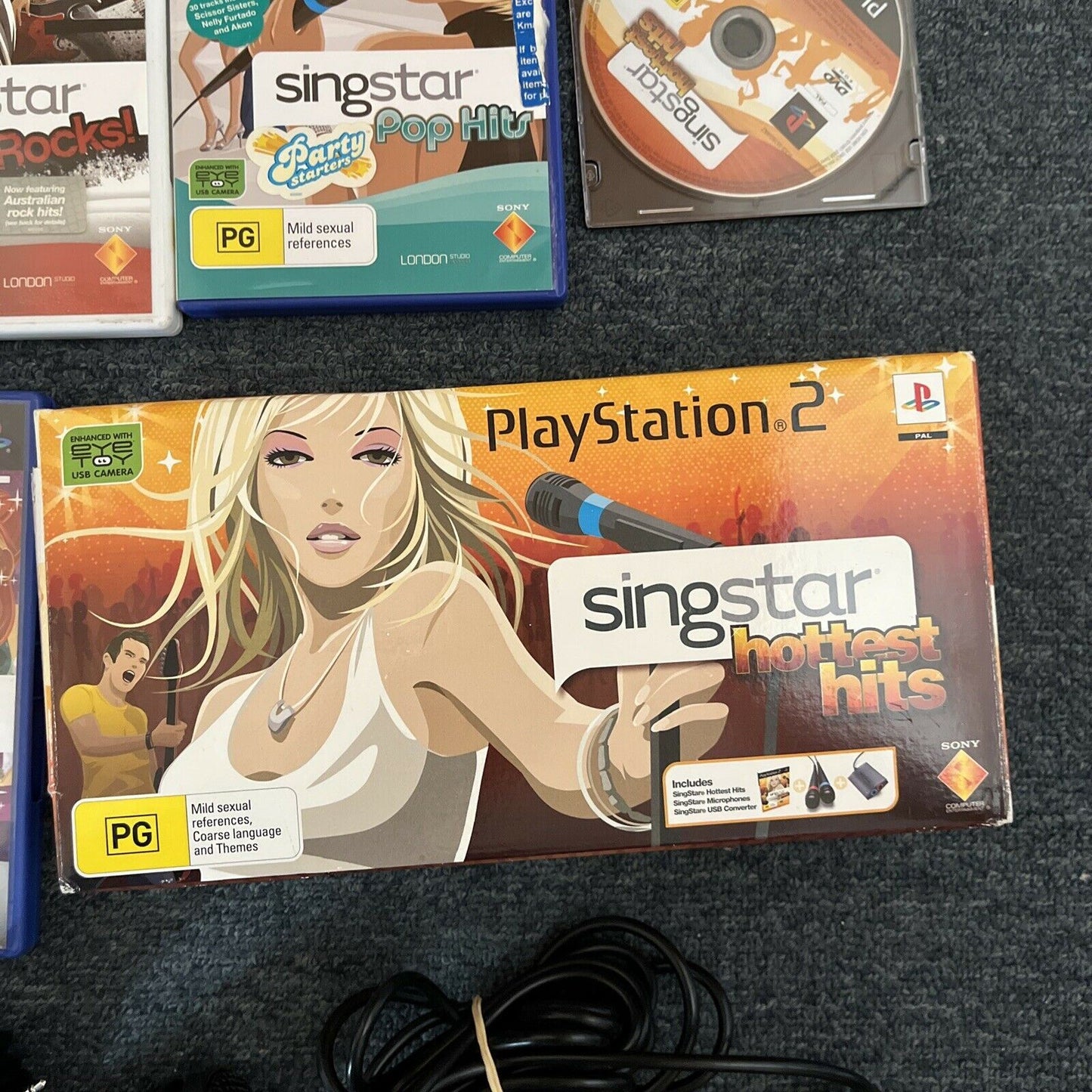 2x SingStar Microphones USB + 6x SingStar PlayStation 2 PS2 Games PAL