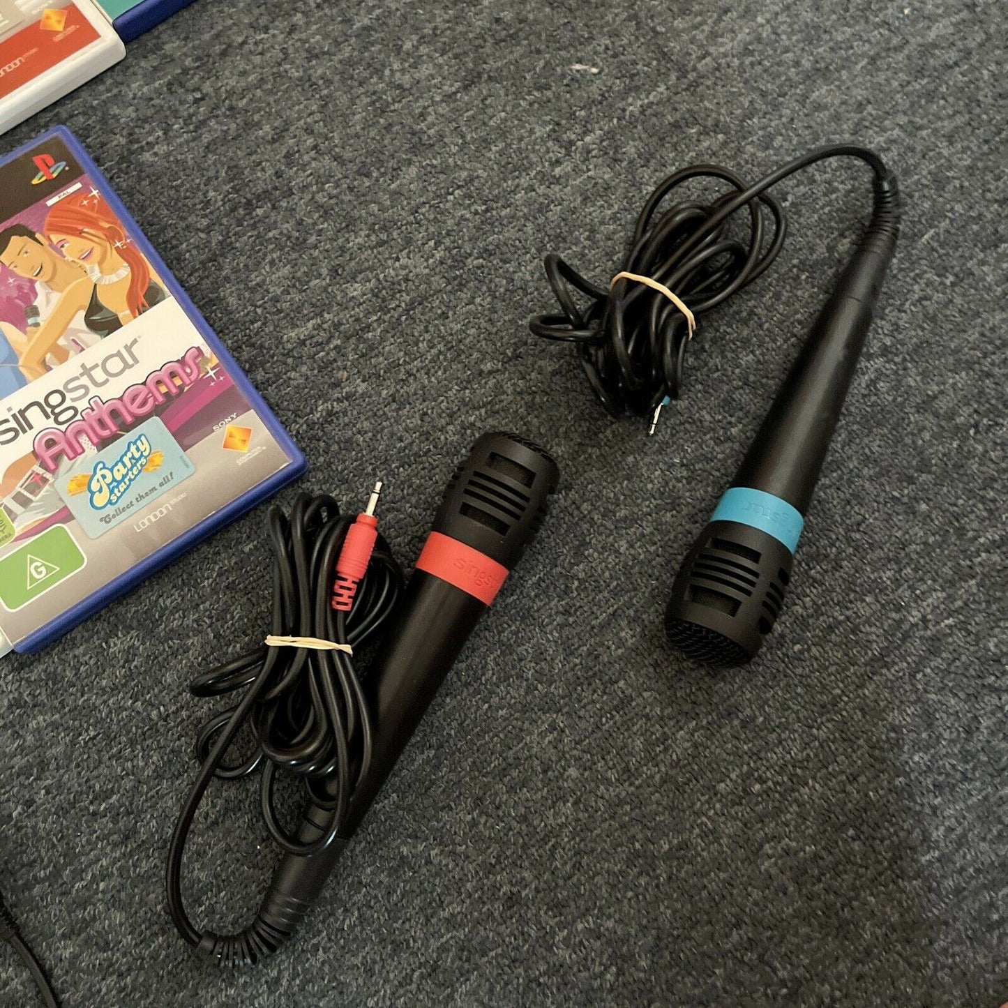 2x SingStar Microphones USB + 6x SingStar PlayStation 2 PS2 Games PAL