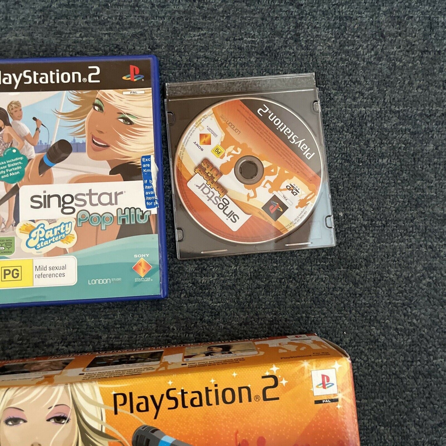 2x SingStar Microphones USB + 6x SingStar PlayStation 2 PS2 Games PAL