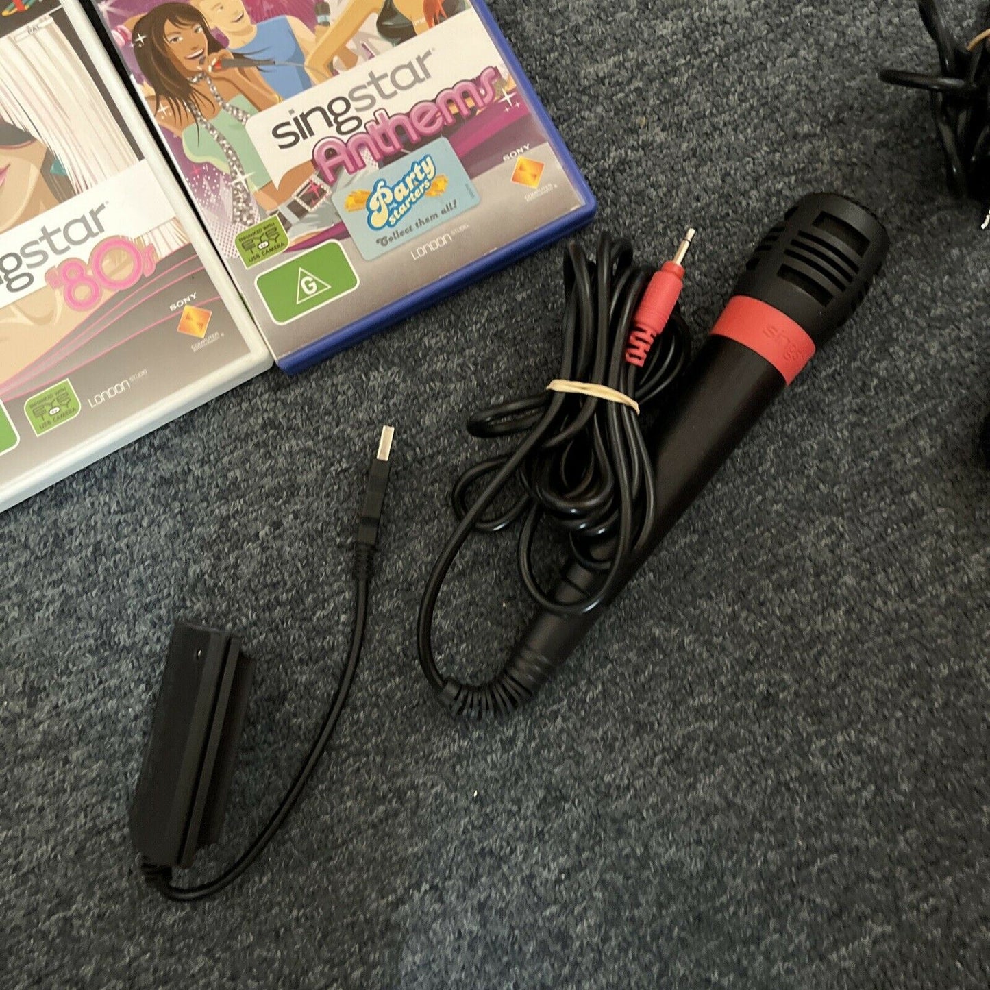 2x SingStar Microphones USB + 6x SingStar PlayStation 2 PS2 Games PAL