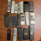 19x Branded Remote Controls for Parts or Repair only & missing Battery Cover