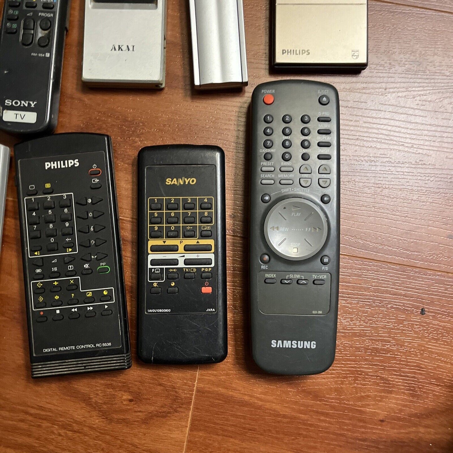 19x Branded Remote Controls for Parts or Repair only & missing Battery Cover