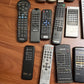 19x Branded Remote Controls for Parts or Repair only & missing Battery Cover