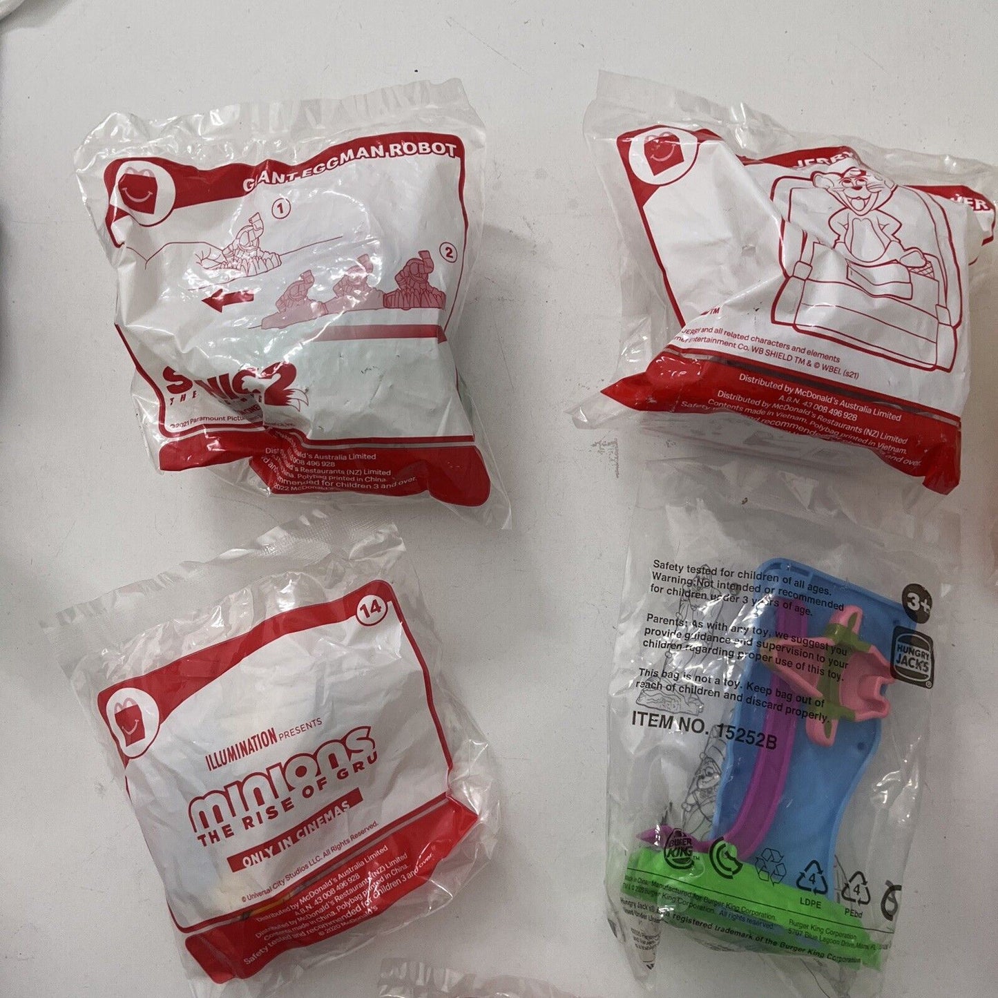 7x McDonald's Hungry Jack's Promotional Toy: Minions, Tom & Jerry, Mr Happy Cup