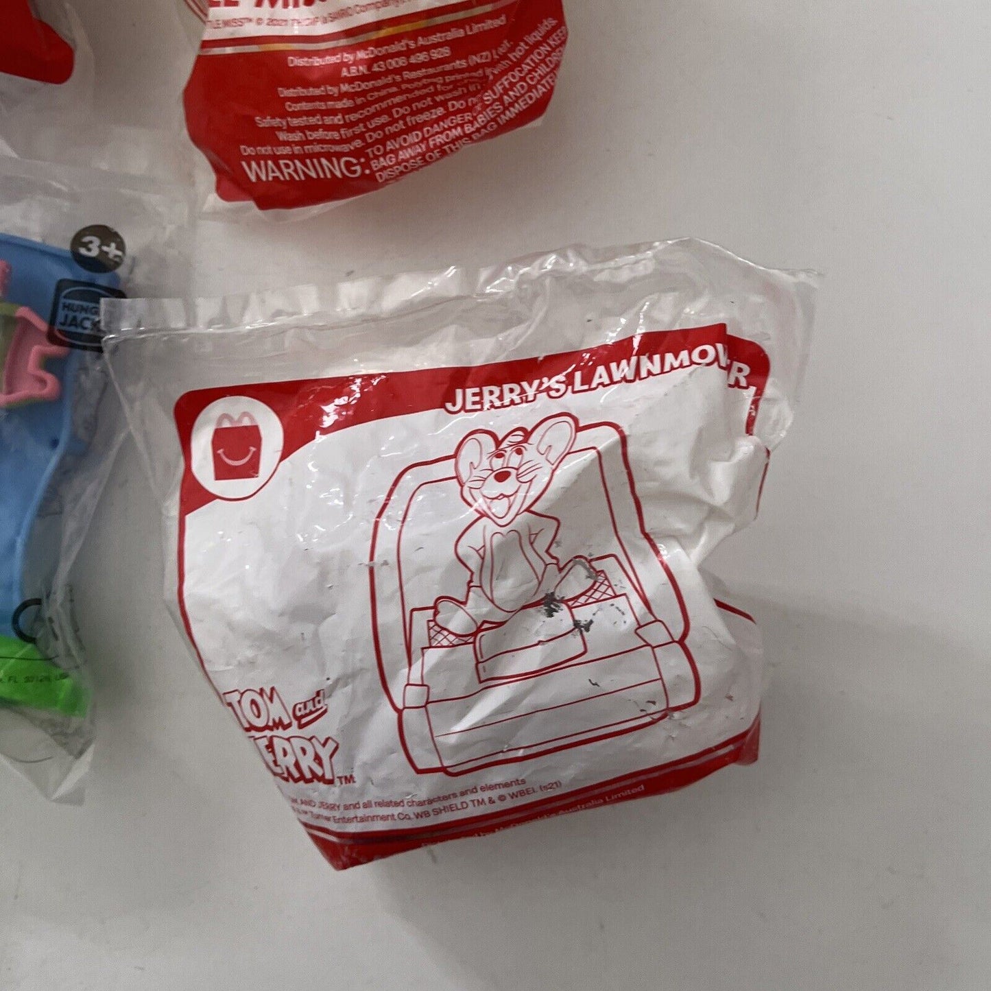 7x McDonald's Hungry Jack's Promotional Toy: Minions, Tom & Jerry, Mr Happy Cup