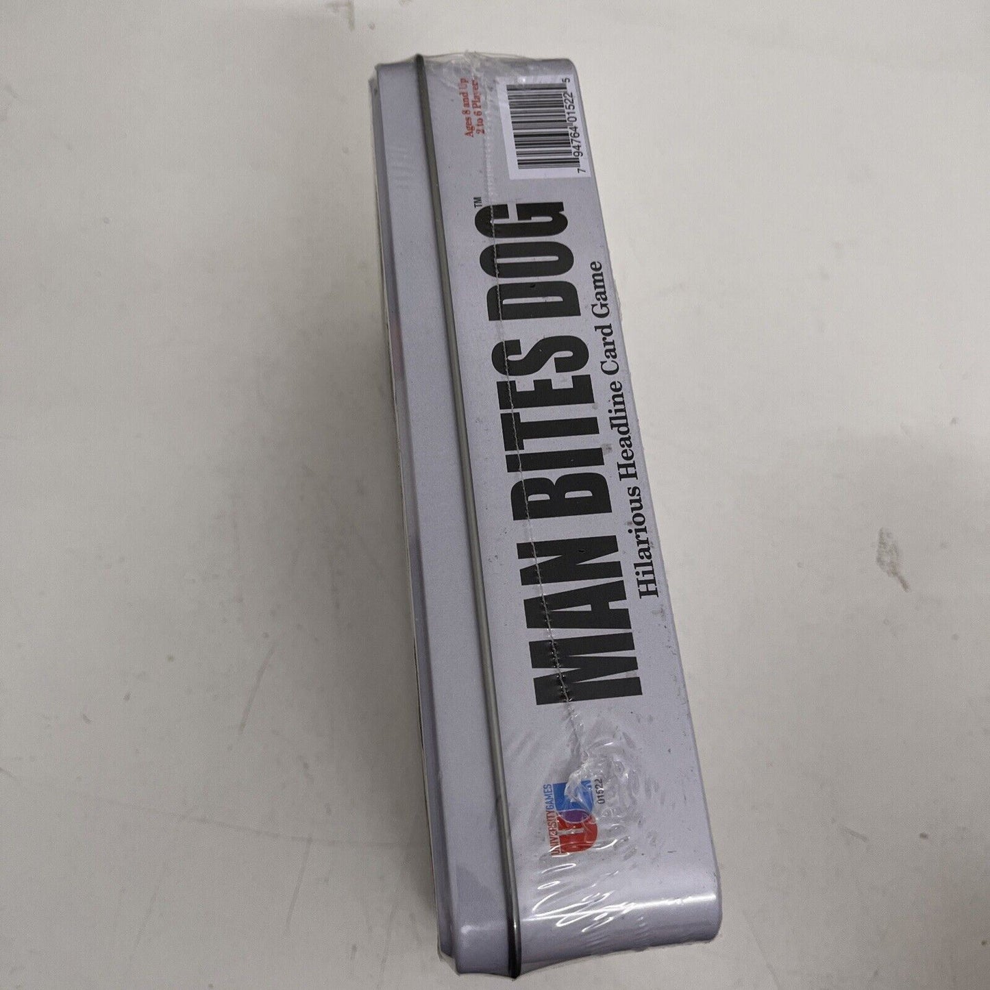 *New Sealed* Man Bites Dog Card Game In a Tin Hilarious Headline