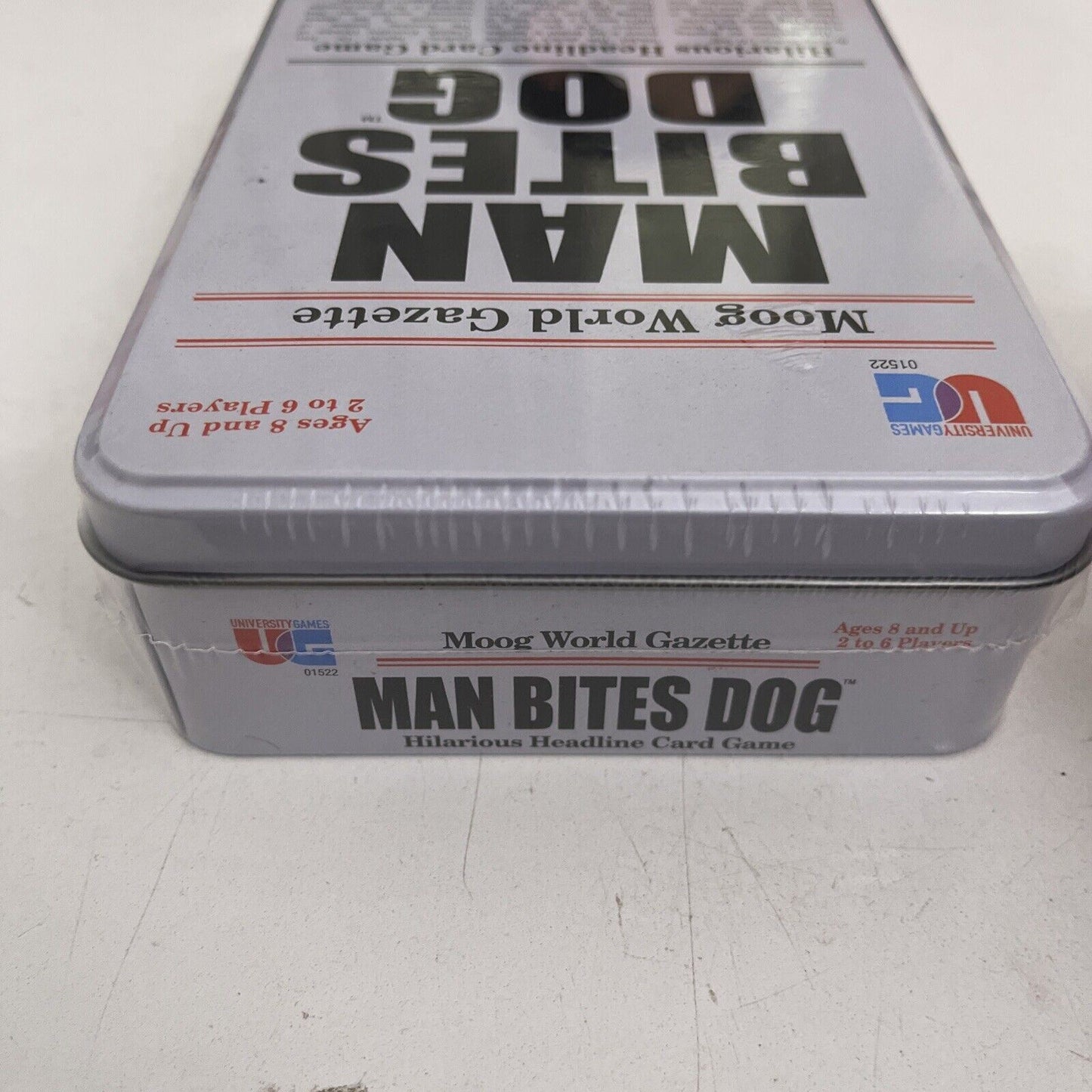 *New Sealed* Man Bites Dog Card Game In a Tin Hilarious Headline