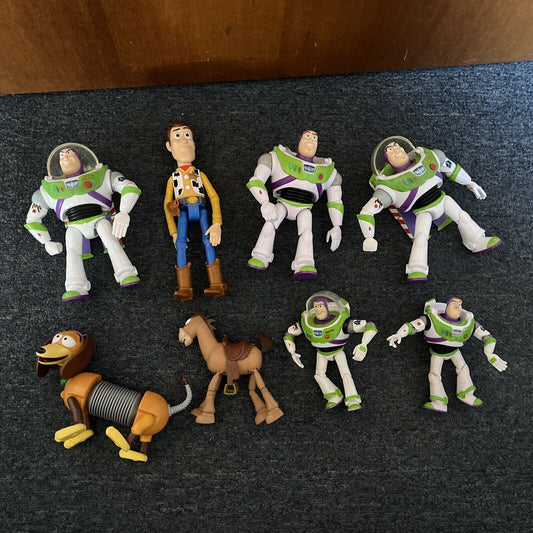 8x Toy Story Figures: Buzz Lightyear, Woody, Slinky, Bullseye