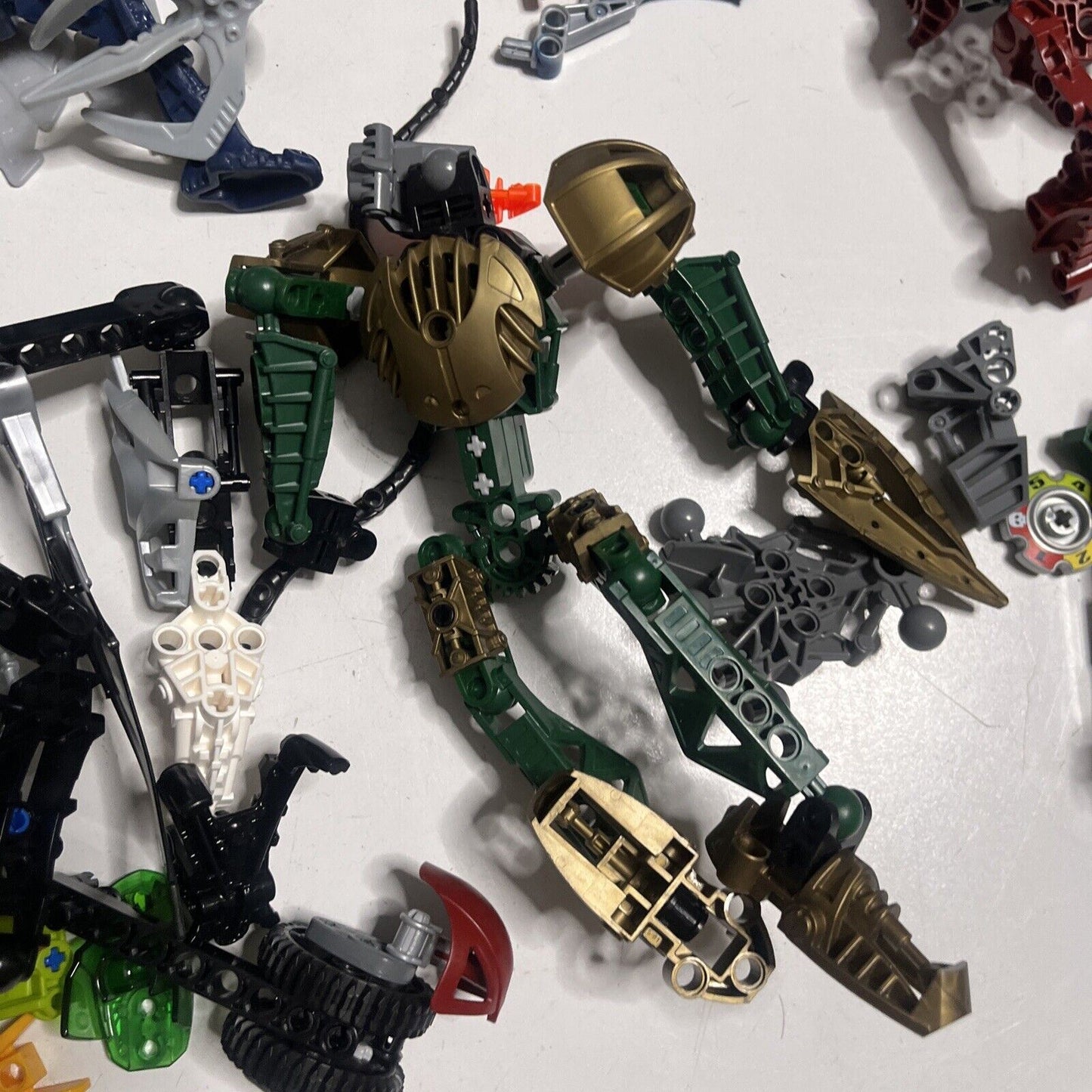 Lego Bionicle 595grams Assorted Characters Weapons and Pieces