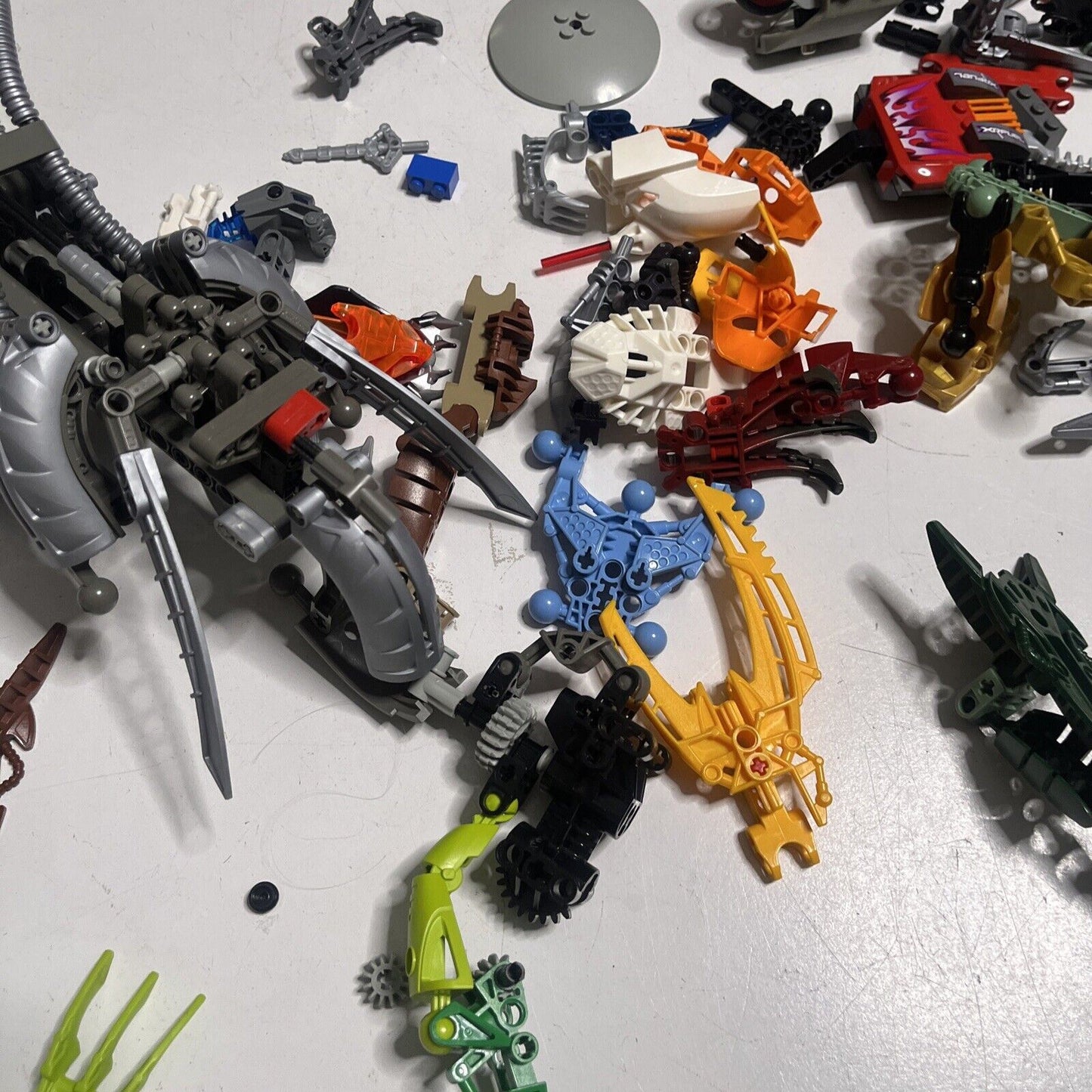 Lego Bionicle  515grams Assorted Characters Weapons and Pieces