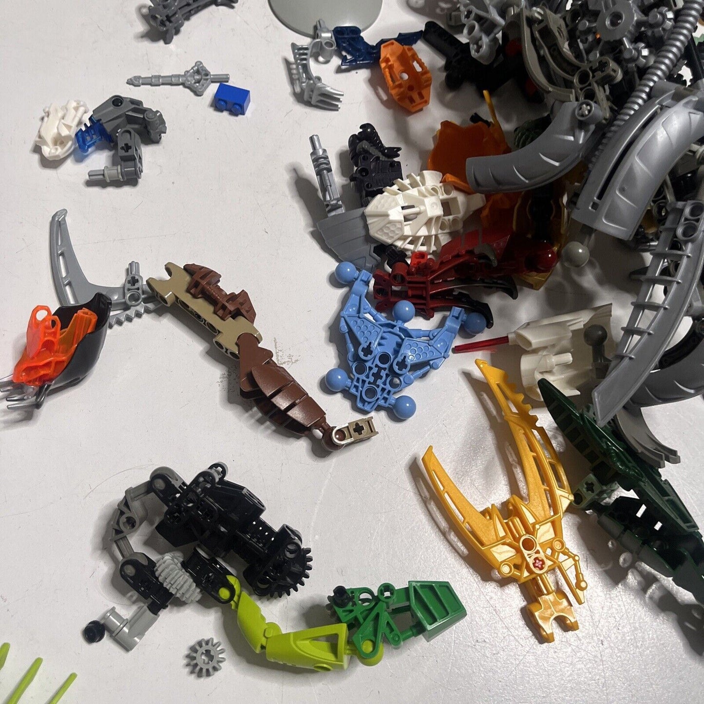 Lego Bionicle  515grams Assorted Characters Weapons and Pieces