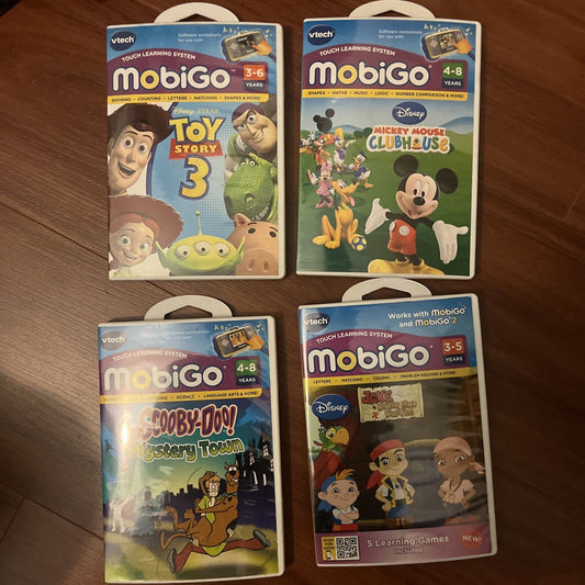 4x Mobigo Games: Mickey Mouse, Scooby-Doo, Jake Never Land Pirates, Toy Story 3