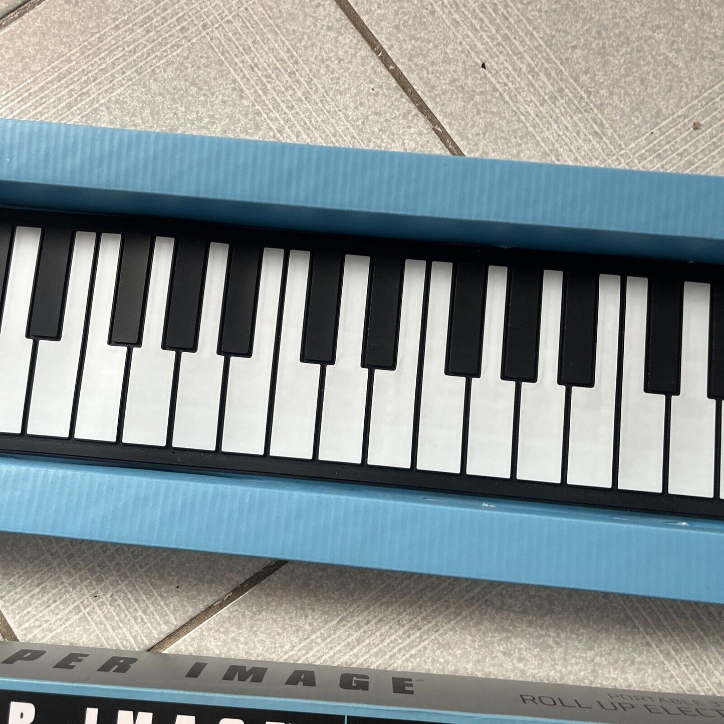 Portable 37-Key Digital Roll Up Electronic Keyboard Flexible By Sharper Image