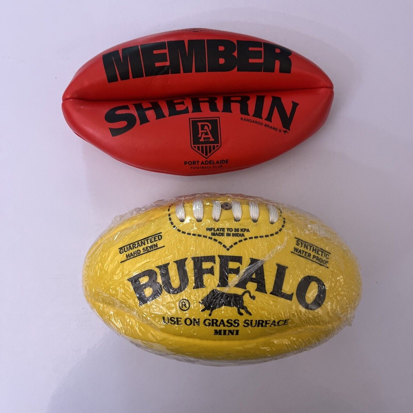 2x NEW Aussie Rules Mini AFL Football: Sherrin Port Adelaide Football & Buffalo