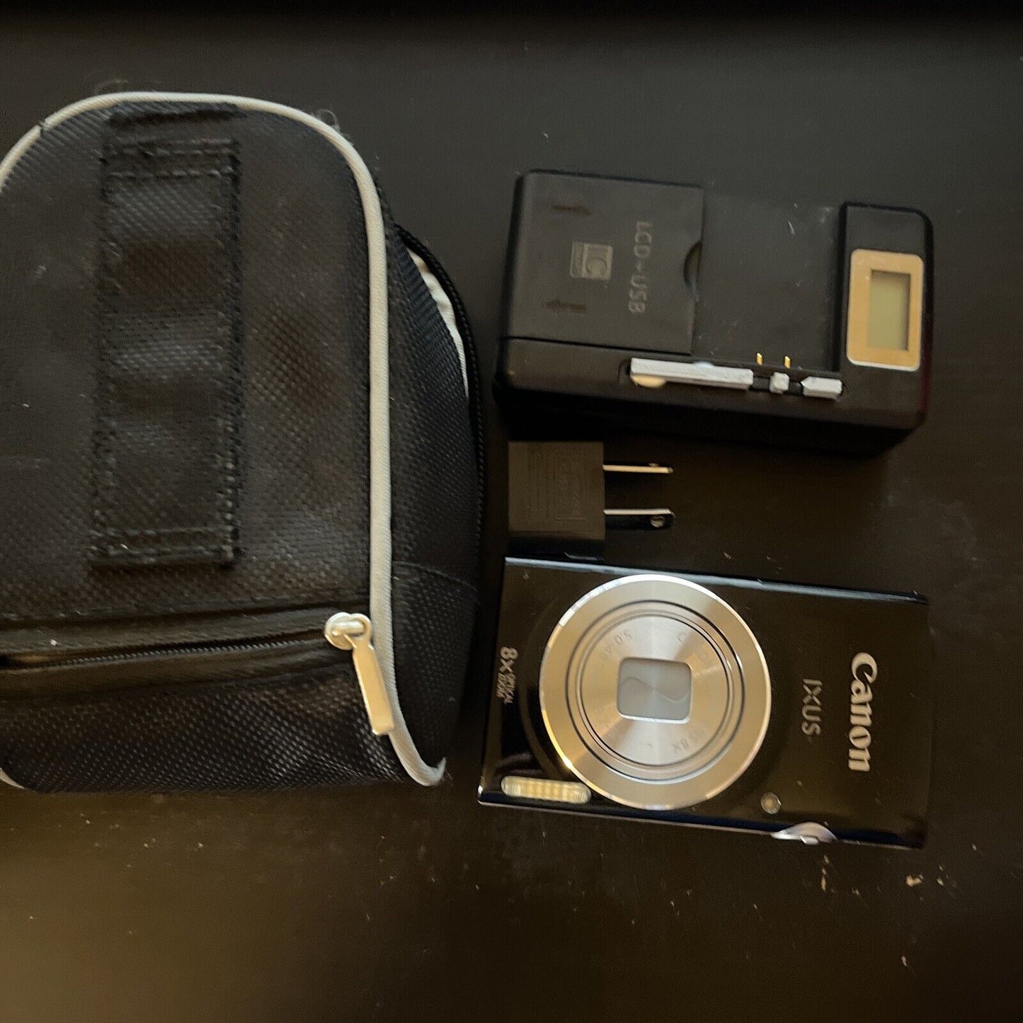 Canon IXUS 145 Compact Digital Camera 16.0 Megapixels 8x Optical Black With Case