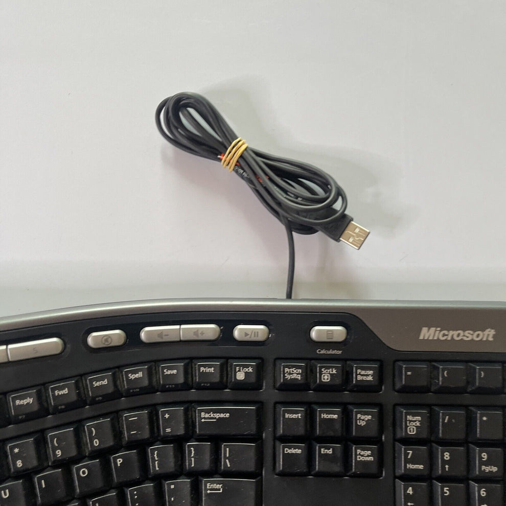 Microsoft Natural Ergonomic Keyboard 4000 V1.0 USB Wired with Palm Res