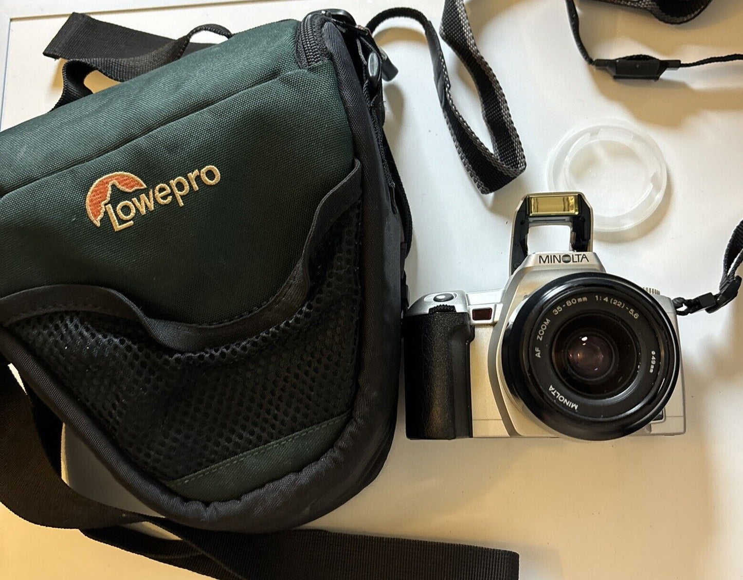 Minolta Dynax 404si SLR Film Camera With AF Zoom 35-80mm Lens And Lowepro Bag