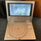 Portable 7-inch DVD Player DVD-300A with carrying case and AC Adapter