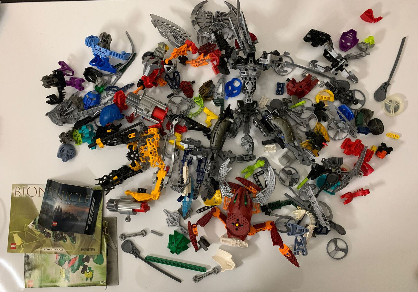 Lego Bionicle Bulk Variety Lot Swords Weapons Parts etc + Manual 975g