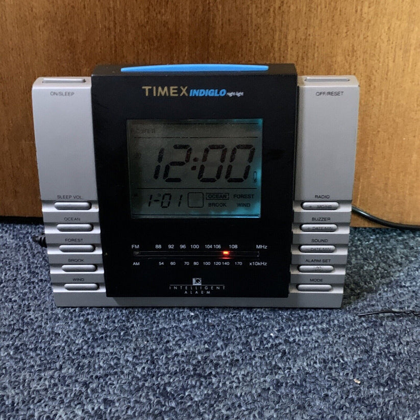 Timex Indiglo Night Light Intelligent Alarm Clock with AM/FM Radio T56